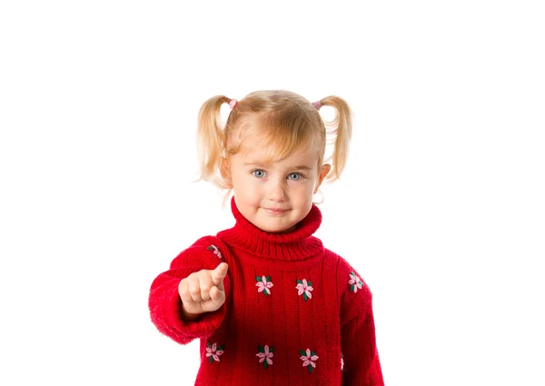Маленькая девочка с хвостиками в тёплом красном свитере на белой спине — стоковое фото