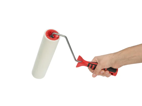 Paint roller i mans hand — Stockfoto