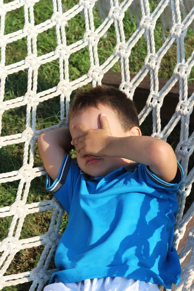 Boy in a hammock — Stock Photo, Image
