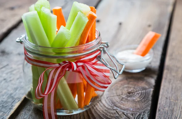 The sticks of carrots and celery, healthy snacks