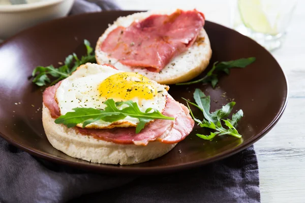 Sandwich with meat and fried egg Stock Picture