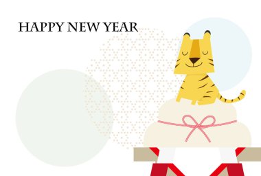 Kagami mochi üzerinde bir kaplan tasviri, bir dekorasyon, ve bir kalıp ve arka planda bir çember.