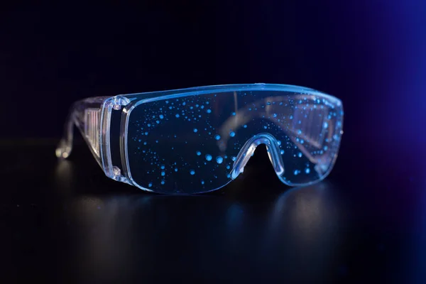 Lunettes Protection Sous Lumière Ultraviolette Avec Gouttes Sur Surface — Photo