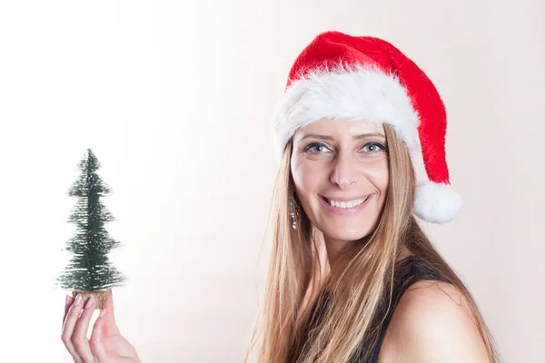 Gelukkig Santa Meisje Geïsoleerd Wit Met Een Kleine Kerstboom — Stockfoto