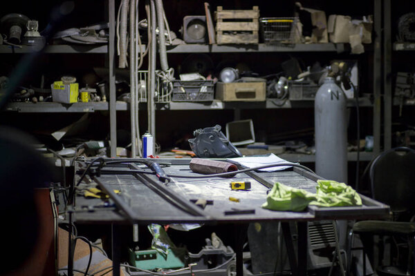 detail of messy workshop with tools