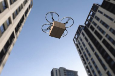 İnsansız hava aracı, açık bir günde şehir ortamında bölgeyi çevreleyen yüksek binalarla birlikte bir paket teslim ediyor.