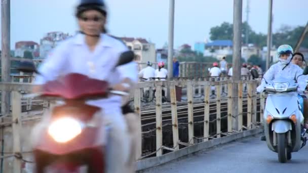 Mopeds Crossing a Train Bridge — Stock Video