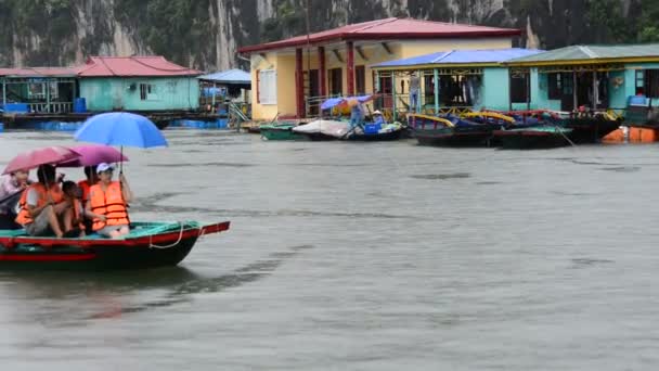 Tourists in Boat in Native Fishing Village — Stock Video