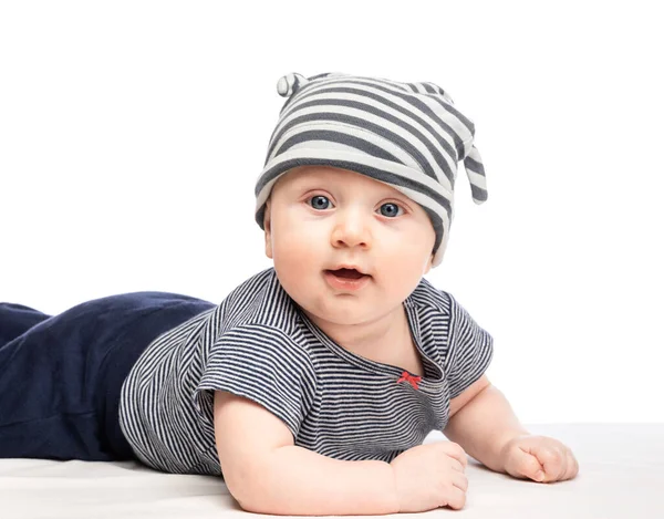 Portrait Cute Months Baby Boy Wearing Striped Cap Shirt Lying — Zdjęcie stockowe