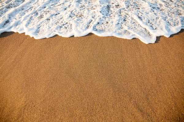 Wave on sandy beach — Stock Photo, Image