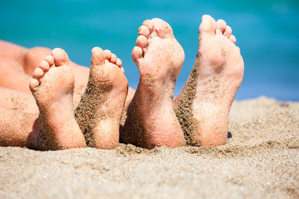 Feet on a beach