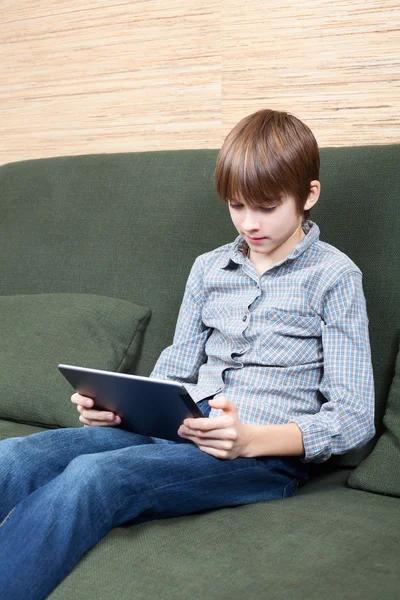 Tween with new tablet computer — Stock Photo, Image