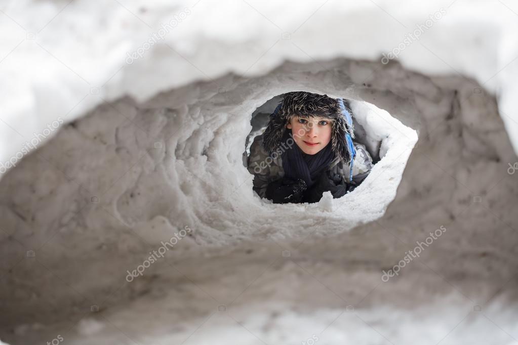 Teen boy at winter outdoors