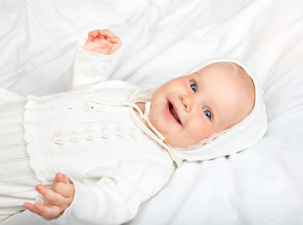 Infant in baptismal clothes — ストック写真