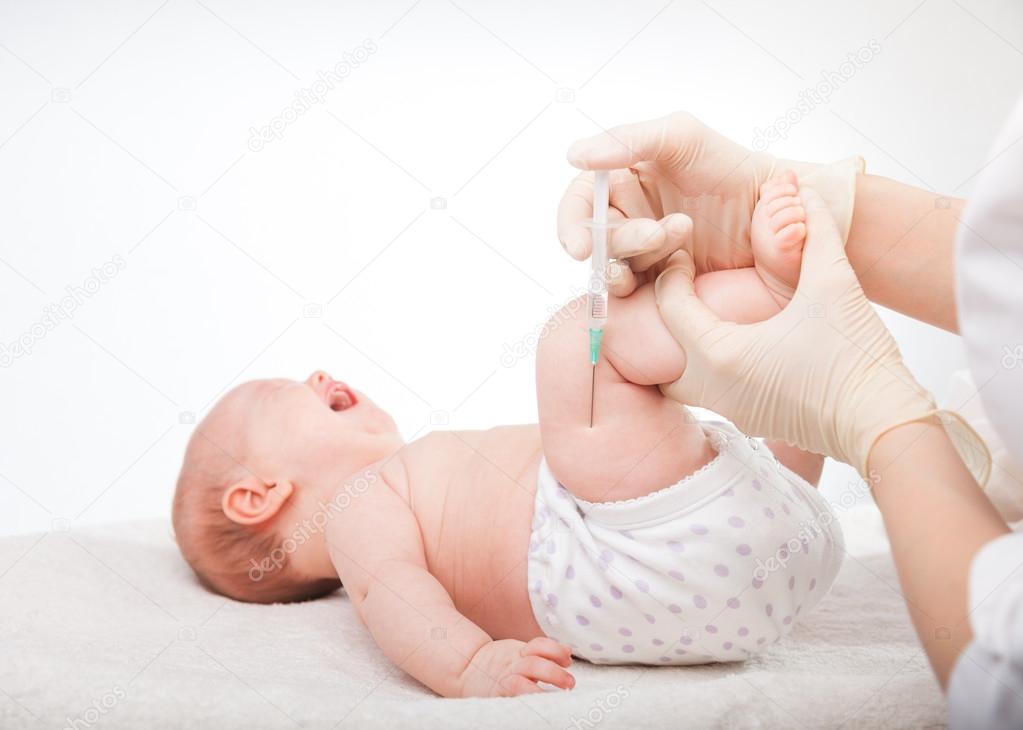 Infant gets an injection