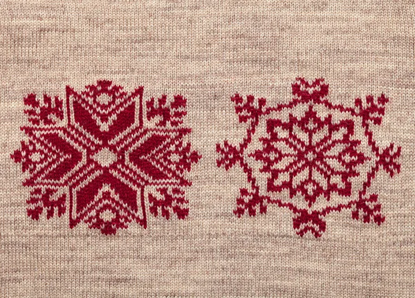 Strickstoff mit Schneeflocken-Ornament — Stockfoto