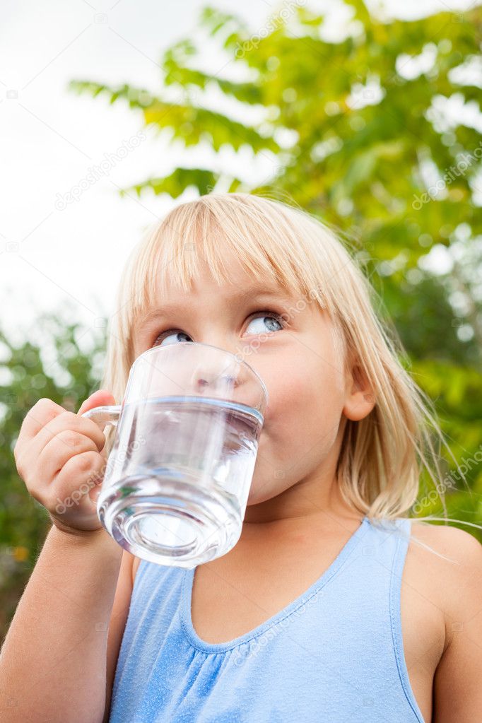 Little girl drinking water