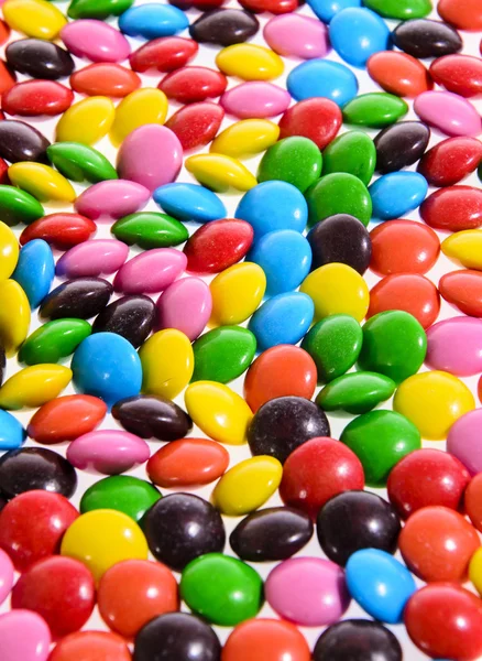 Fundo colorido doce saboroso bombons doces — Fotografia de Stock