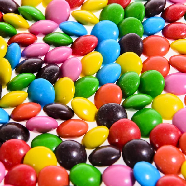 Fond coloré Bonbons savoureux sucrés bonbons — Photo