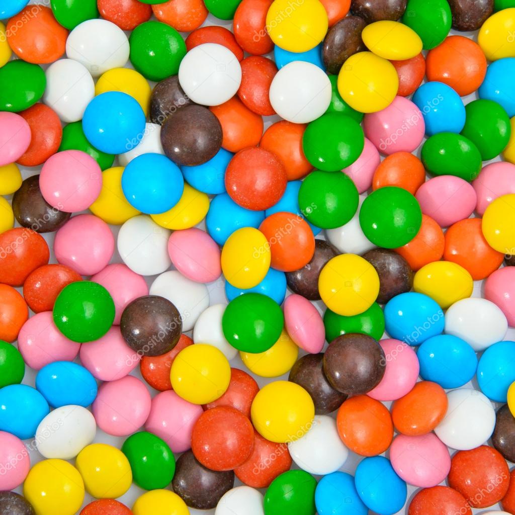 カラフルな背景甘いおいしいボンボン菓子 ストック写真 C Oleggankod