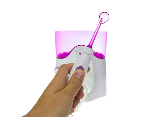 Tanden poetsen, Massage tandvlees. Irrigator voor het reinigen van de mondholte — Stockfoto