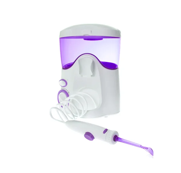 Spazzolatura dei denti, gengive per massaggi. Irrigatore per la pulizia della cavità orale — Foto Stock