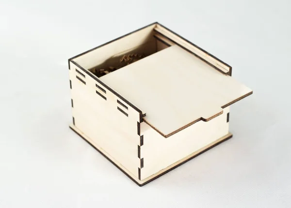 square wooden box on a white background