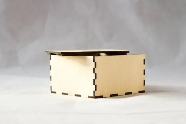 square wooden box on a white background