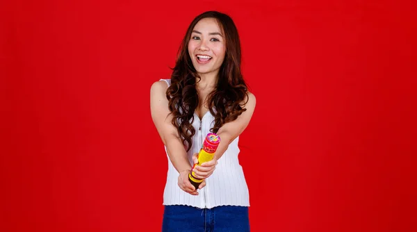 Funny Young Cure Asian Girl Holding Blowing Out Party Poppers — Stock Photo, Image