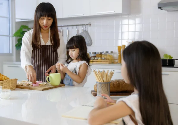 Cute Little Years Old Asian Girl Sitting Doing Homework Kitchen — Stock Photo, Image