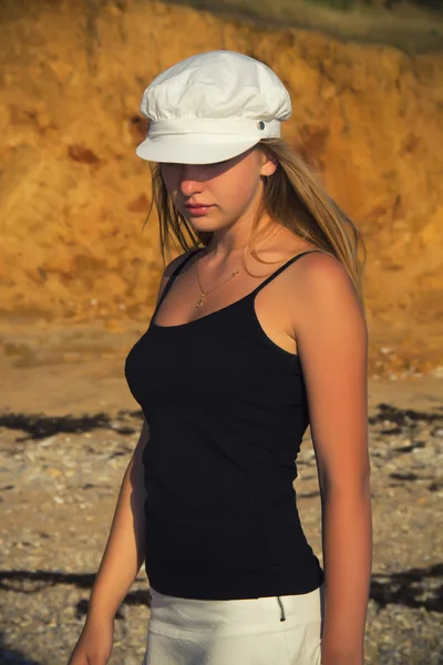 Blonde in a cap — Stock Photo, Image