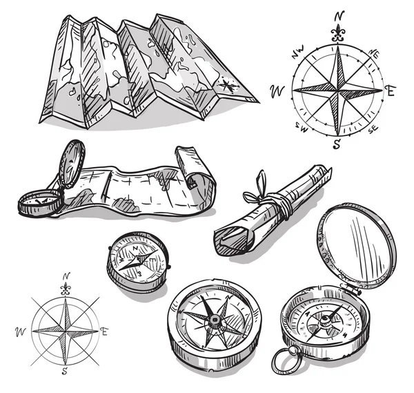 Set of hand drawn compasses and maps — Stock Vector