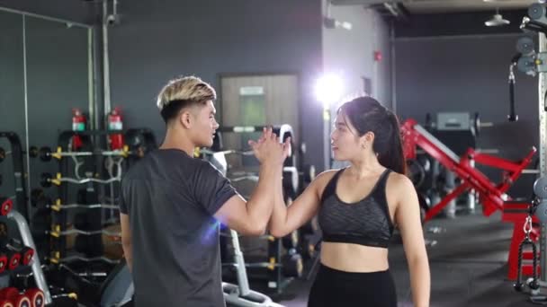 Asian Man Woman Giving High Five Each Other Exercising Gym — Stock Video