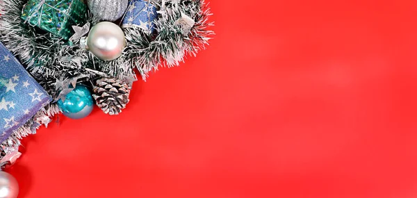 Decorations for the new year on a red background — Stock Photo, Image