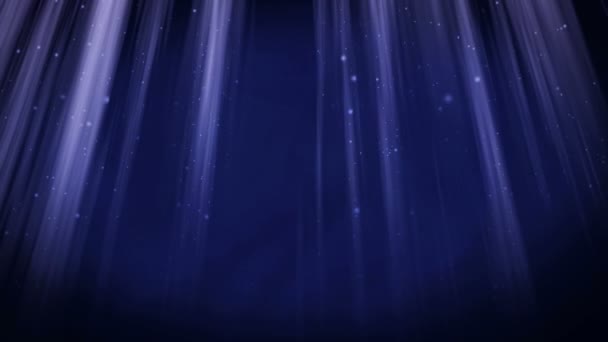 Fond bouclable volant particules bleues dans des faisceaux lumineux 