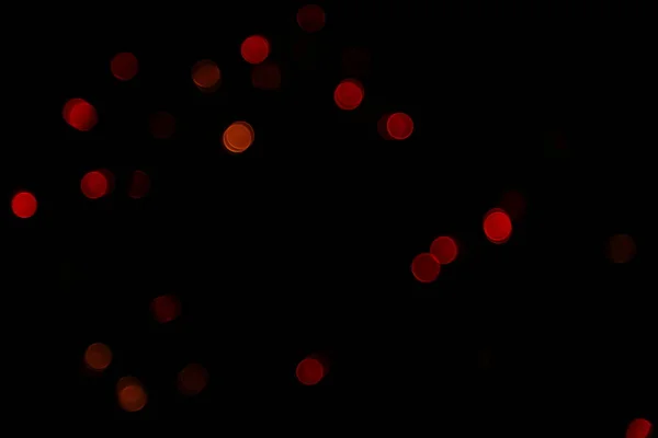 Bokeh Von Roten Lichtern Auf Schwarzem Hintergrund — Stockfoto