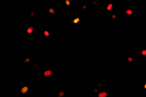 Bokeh Von Roten Lichtern Auf Schwarzem Hintergrund — Stockfoto