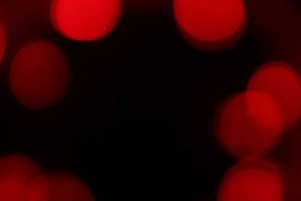 Rote Bokeh Lichter Auf Schwarzem Hintergrund Weihnachtsbeleuchtung Textur Für Design — Stockfoto