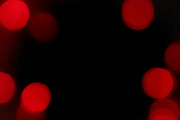 Rode Bokeh Lichten Een Zwarte Achtergrond Kerstverlichting Textuur Voor Design — Stockfoto