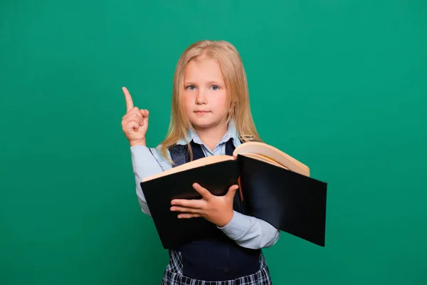 Girl School Uniform Book Hands Isolated Green Background — Stock Photo, Image