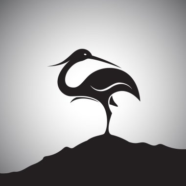 Vector image of an stork standing on the rocks. clipart