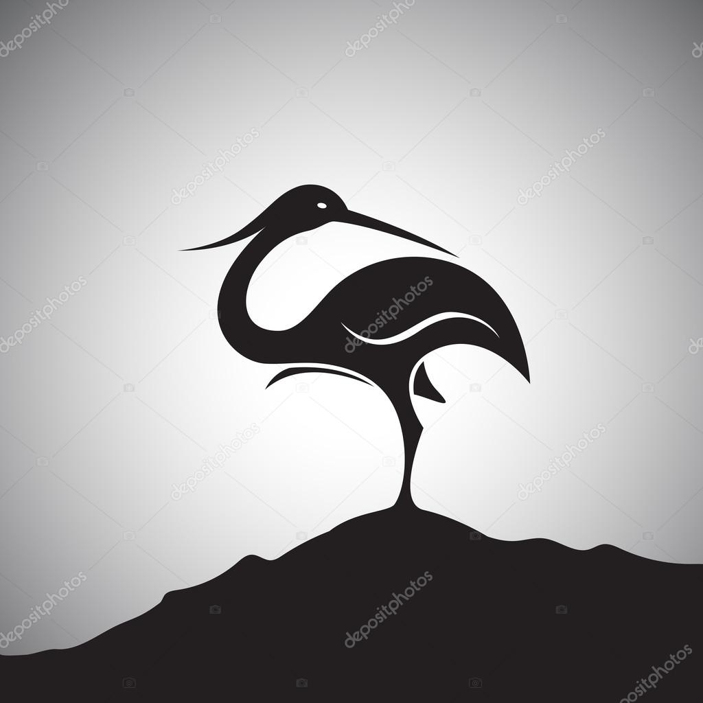 Vector image of an stork standing on the rocks.