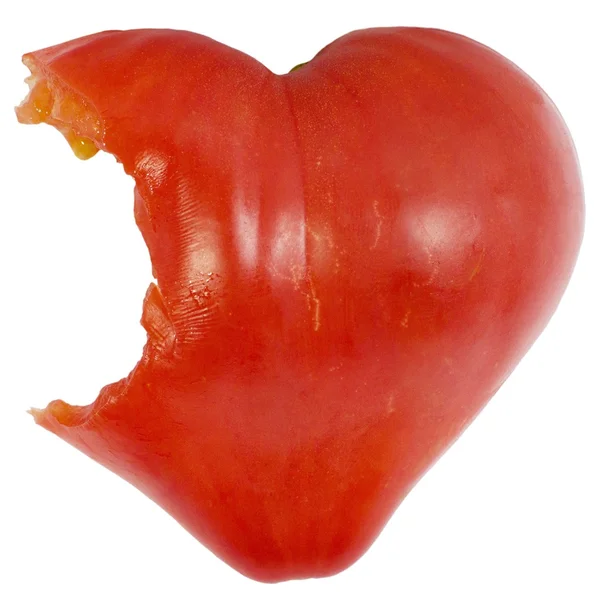 Angebissene herzförmige Tomate — Stockfoto