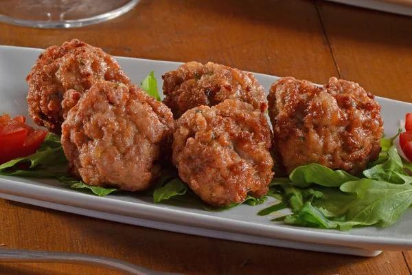 Fried meat balls filled with cheese