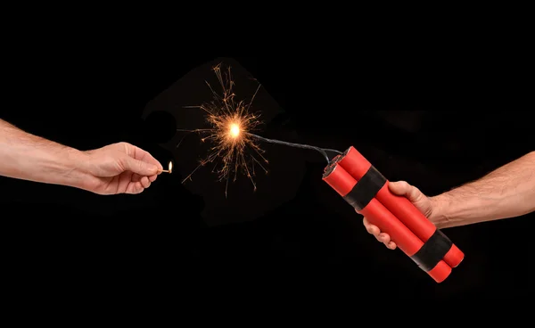 Holding a dynamite stick — Stock Photo, Image