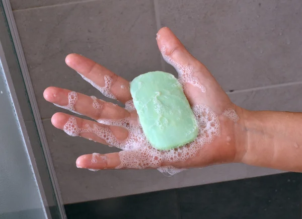 Soap bar on hand — Stock Photo, Image