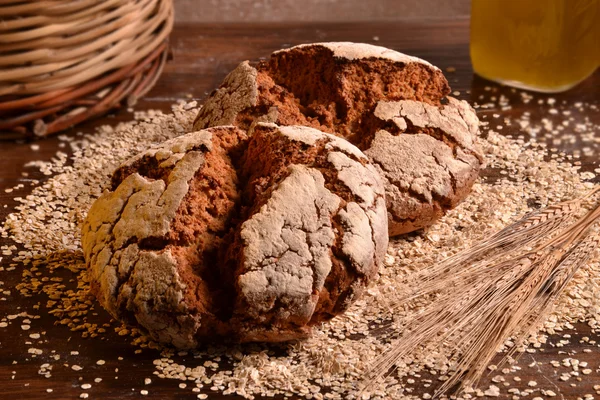 Rustic bread and wheat — Stock Photo, Image