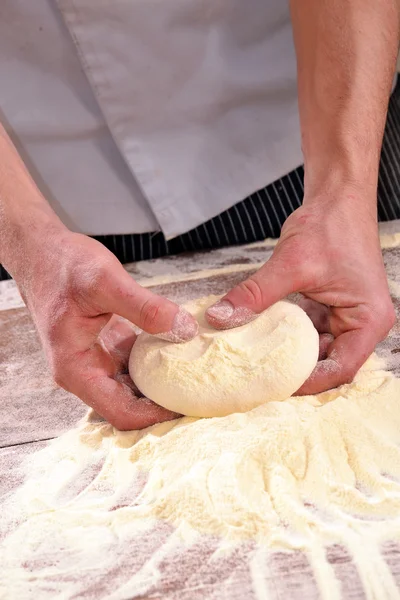 Cook preparing pizza dough. — Stock Photo, Image