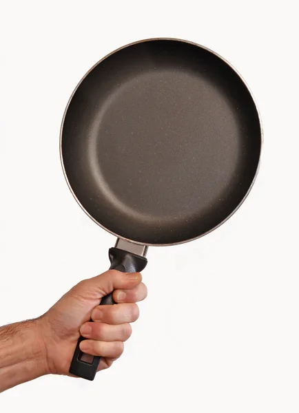 Hand met een pan — Stockfoto