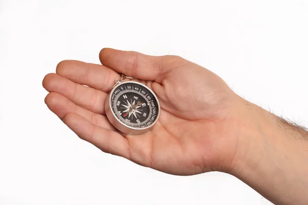 Ręka trzymająca kompas — Zdjęcie stockowe